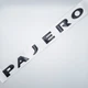 Эмблема надпись Pajero Mitsubishi (чёрный, глянец) 31,3*2,5 см - изображение 1