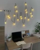 Светодиодная гирлянда "Лампочки матовые" 5см, 20 LED, 7м, черный провод, Теплый белый - изображение 9