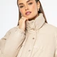 Жіноча куртка-пуховик з екошкіри світло-бежевий 95_9D_100_9_3XL, XXXL - изображение 5