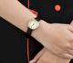 Жіночий годинник Casio LTP-V005GL-9AUDF в жовто-золотистому кольорі з коричневим відтінком. - зображення 2
