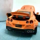 Машинка Auto Expert Nissan GTR металева 1:32 світло/звук/інерційна Помаранчева (38071) - зображення 11