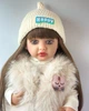 Большая виниловая кукла в полушубке Reborn Baby Doll с настоящими волосами и живыми глазами - изображение 4