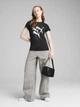 Футболка хлопковая женская Puma Graphics Branded Leaf Tee 68508201 L Black с принтом (4067984234865) - изображение 3
