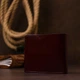 Портмоне жіноче SHVIGEL з натуральної шкіри глянцеве на кнопці Вишневе 55706 - зображення 7