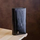 Женский кошелек ST Leather из натуральной кожи черный большой горизонтальный с монетницей на кнопке 17 5х9х3 5 см 56518 - изображение 6