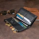 Женский кошелек ST Leather из натуральной кожи черный вертикальный на хлястике с кнопкой 19х9х1 7 см 56542 - изображение 10