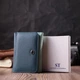 Женский кожаный кошелек ST Leather разноцветный вертикальный тройного сложения с монетницей 55541 - изображение 8