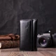 Шкіряна ключниця ST Leather чорна на кнопках з відділенням для купюр та 6 карабінами 12х7 5 см 56006 - зображення 6