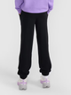 Spodnie dresowe dziecięce dla dziewczynki joggery 4F 4FJWMM00TTROF1189-20S 134 cm Czarne (5905700384670) - obraz 2