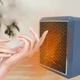 Портативний керамічний обігрівач на 1500Вт Handy Heater Pure Warmth / Электрообогреватель с подсветкой - зображення 2