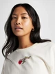 Футболка хлопковая короткая женская Converse Tlmn Vday Crop Os Tee 10028306-286 S Egret с принтом (194435447766) - изображение 4
