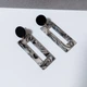 Серьги длинные из акрила DeKolie MK0997-4 белый с черным - изображение 5