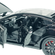 Машинка Автопром "Tesla Модель S с зарядной станцией" черная, 1:24 (18 см) AP7713-4 - изображение 3