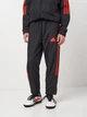 Подростковые спортивные штаны для мальчика Adidas J Hot Wv Tiro IV7104 134-140 см Черные (4067896486772) - изображение 1