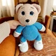 М'яка плюшева іграшка handmade Ведмедик 34 см бежево-біло-синій у ковпаку в'язаний гачком амігурумі - зображення 3