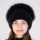 Женская меховая норковая шапка на вязаной основе с помпоном из меха песца Меховой Стиль Улитка 54-60 Темный ирис (131/J) - изображение 2