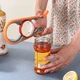 Открывалка для бутылок и банок Opener Kitchen Tool 4 в 1 Оранжевый - изображение 1