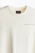 Футболка з принтом H&M Loose Fit XL білий 1034065120 - зображення 7