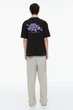 Футболка с принтом H&M Loose Fit L темно-коричневий 1034065133 - зображення 4
