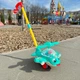 Игрушка каталка детская вертолет с ручкой, со звуком звоночка, движущиеся элементы глаза и язык, подсвечивание бирюзовый - изображение 5