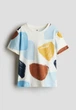 Футболка біла Плямиста H&M 134-140см (400010438) - зображення 1