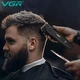 Профессиональный набор для стрижки волос 2 в 1 VGR V-640 машинка для стрижки и триммер со сменными насадками Black - изображение 7