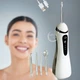 Ирригатор для полости рта 200 мл беспроводной аккумуляторный Oral Irrigator, портативный с 3 режимами работы и 4 сменными насадками для ухода за зубами, деснами и брекетами Белый, RGL-137-White - изображение 10