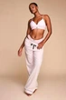 Бюстгальтер Victoria's Secret Shine Patch Lightly Lined Wireless Bra Рожева смужка 34A (75A) - зображення 4