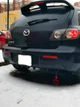 Накладка на задний бампер Mazda 3 акули плавники канарды универсальная черного цвета - изображение 13