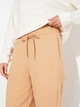 Спортивные штаны женские Puma Her Comfort High-Waist Sweatpants Tr Cl 68566763 M Warm Beige (4067984236555) - изображение 4