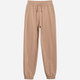 Spodnie dresowe dziewczęce joggery 4F 4FJWSS25TTROF1187-83S 128 cm Beżowe (5905700426165) - obraz 4