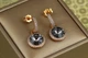 Сережки підвіски Xuping Jewelry Сваровськи Романс із чорними каменями 2,8 см золотисті - зображення 1