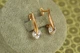 Серьги Xuping Jewelry Повитруля с белым камнем 2 см золотистые - изображение 2