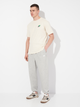 Spodnie dresowe męskie New Balance Small Logo MP41519 S Szare (197375356761) - obraz 3