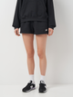Spodenki sportowe damskie krótkie New Balance Nb Small Logo WS41500 XS Czarne (197375375519) - obraz 1
