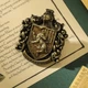 Брошь из фильма Гарри Поттер на одежду / рюкзак / пенал / портфель Harry Potter значок - пин герба факультета Пуффендуй / Гафелпаф из школы магии Хогвартс, 4х3.5 см, разноцветный (106931536) - изображение 1