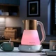 Russell Hobbs Электрочайник Calm, 1.7л, стекло, музыка, подсветка, сенсор, бело-медный - изображение 3