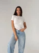 Жіноча літня футболка асиметричного крою Uaclothes 46-48 Білий (like33629-140331350) - изображение 2