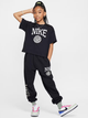 Підліткова футболка для дівчинки Nike G Nsw Tee Graphic Star HM6303-010 137-147 M Чорна (197602726749) - зображення 4