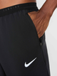 Spodnie dresowe męskie Nike M Nk Df Stride Wvn Pant HV4544-010 M Czarne (197860503618) - obraz 5