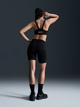 Спортивний топ для бігу жіночий Nike W Nk Df Indy Hgh Spt Bra FD1068-010 S Чорний (197593084620) - зображення 4