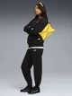 Спортивный костюм женский на флисе Puma 68816001 XS Black (4069157430807) - изображение 1