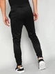 Спортивные штаны для футбола мужские Puma teamRise Trg 65739003 M Черные (4063697242357) - изображение 2