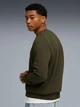 Свитшот на флисе мужской Puma Essentials Graphics 68470970 2XL Dark Olive с принтом (4069157461641) - изображение 2