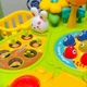 Детский игровой развивающий столик YANUO для малышей от 18 месяцев с множеством пальчиковых игр для мелкой моторики - изображение 10