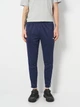 Спортивные штаны для футбола мужские Puma Teamliga Training 65724206 M Navy-White (4063697063983) - изображение 1
