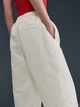Спортивные штаны женские Nike W Nsw Nk Liq Shine Pant HV2475-133 L Бежевые (0198485084469) - изображение 6