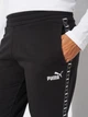 Спортивные штаны женские Puma Essentials Tape 68809801 S Black (4069157464086) - изображение 4