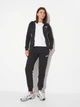 Спортивный костюм женский на флисе Puma 69073801 M Black (4069157444170) - изображение 1