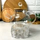 Заварочный стеклянный чайник на печке для свечи 1 л Crystal - изображение 1